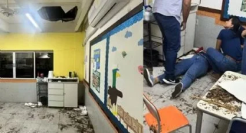 Professora cai de um andar para outro após buraco abrir no chão da sala de aula